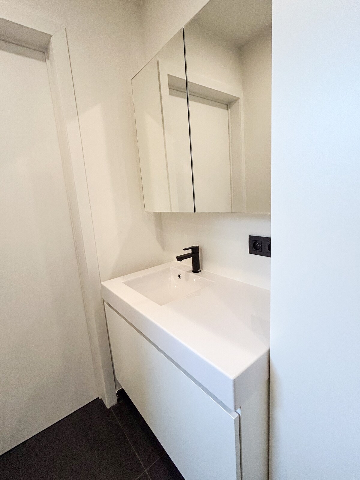 Quiet bathroom finish at The Jacob House